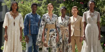 Models wearing sustainable fashion in an urban green space, highlighting eco-friendly clothing choices.